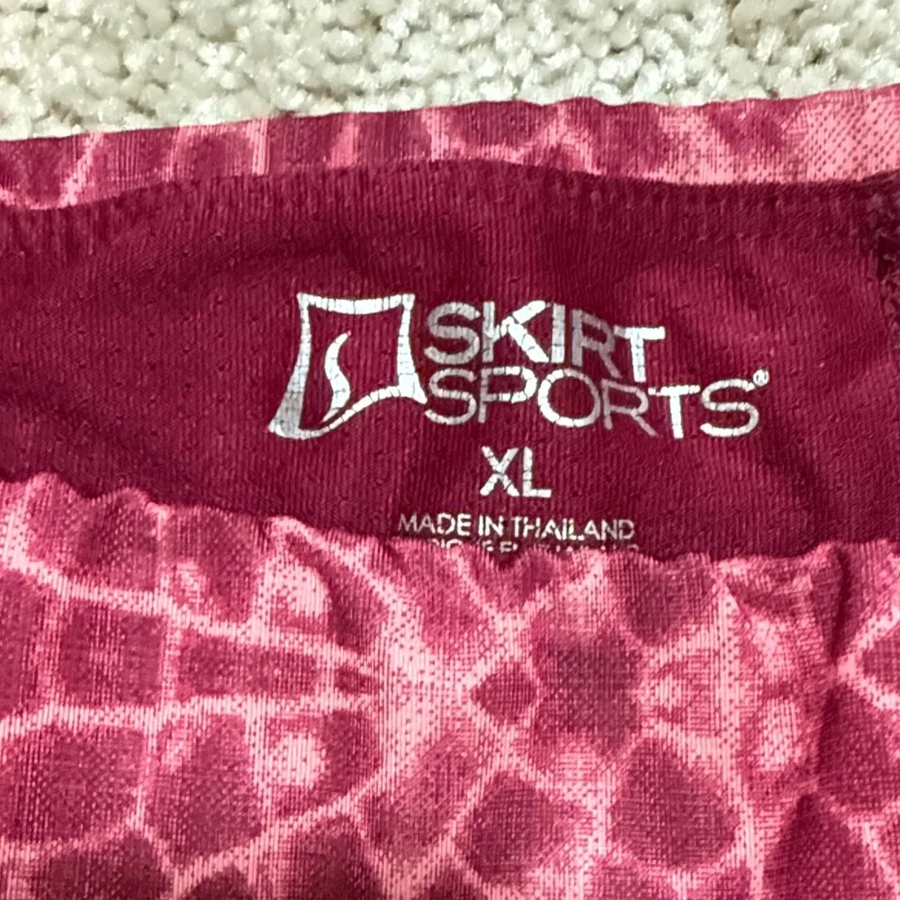 SkirtSports dark red/ light pink Patterned skort with built in shorts. - Picture 2 of 6